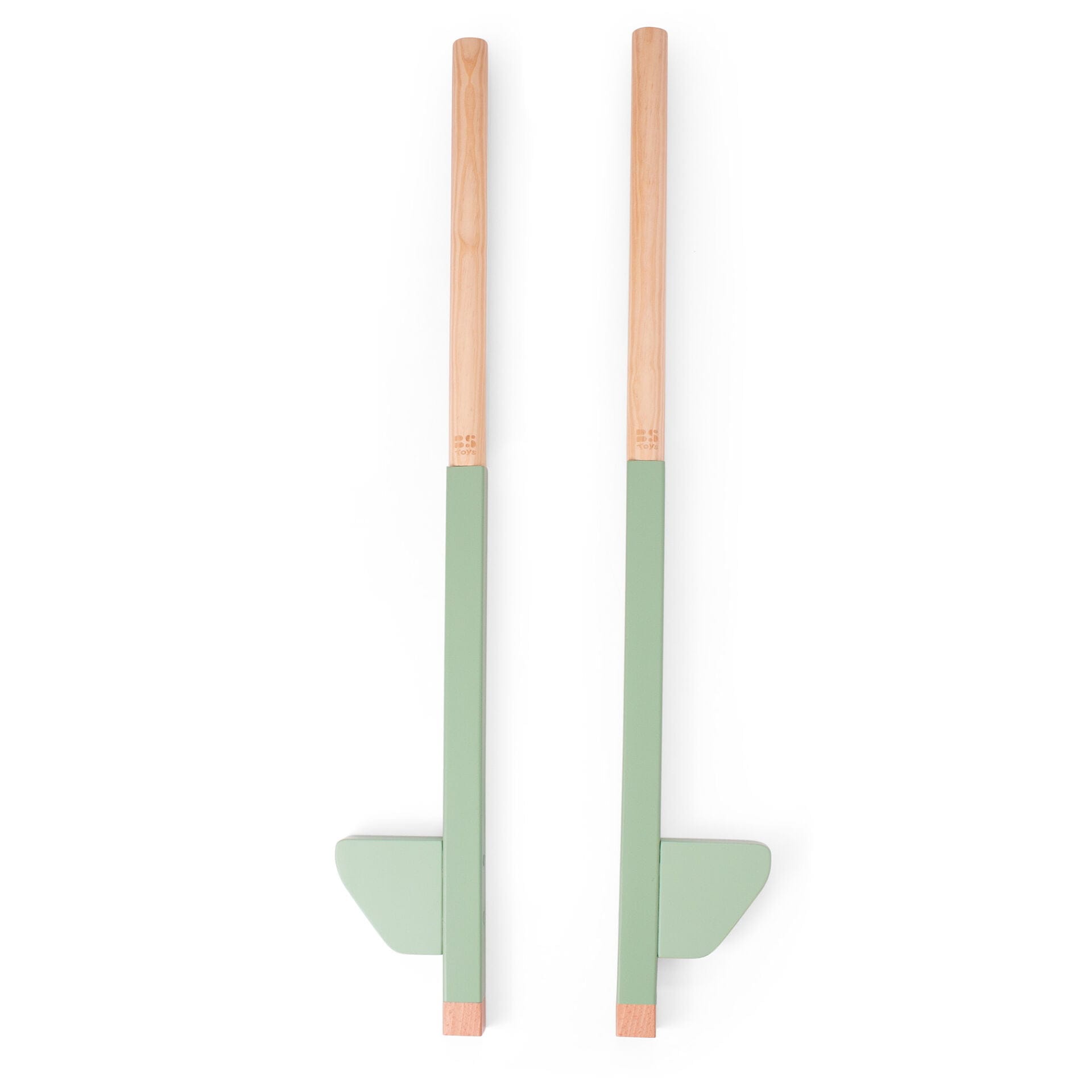 A pair of wooden stilts with green leg pieces