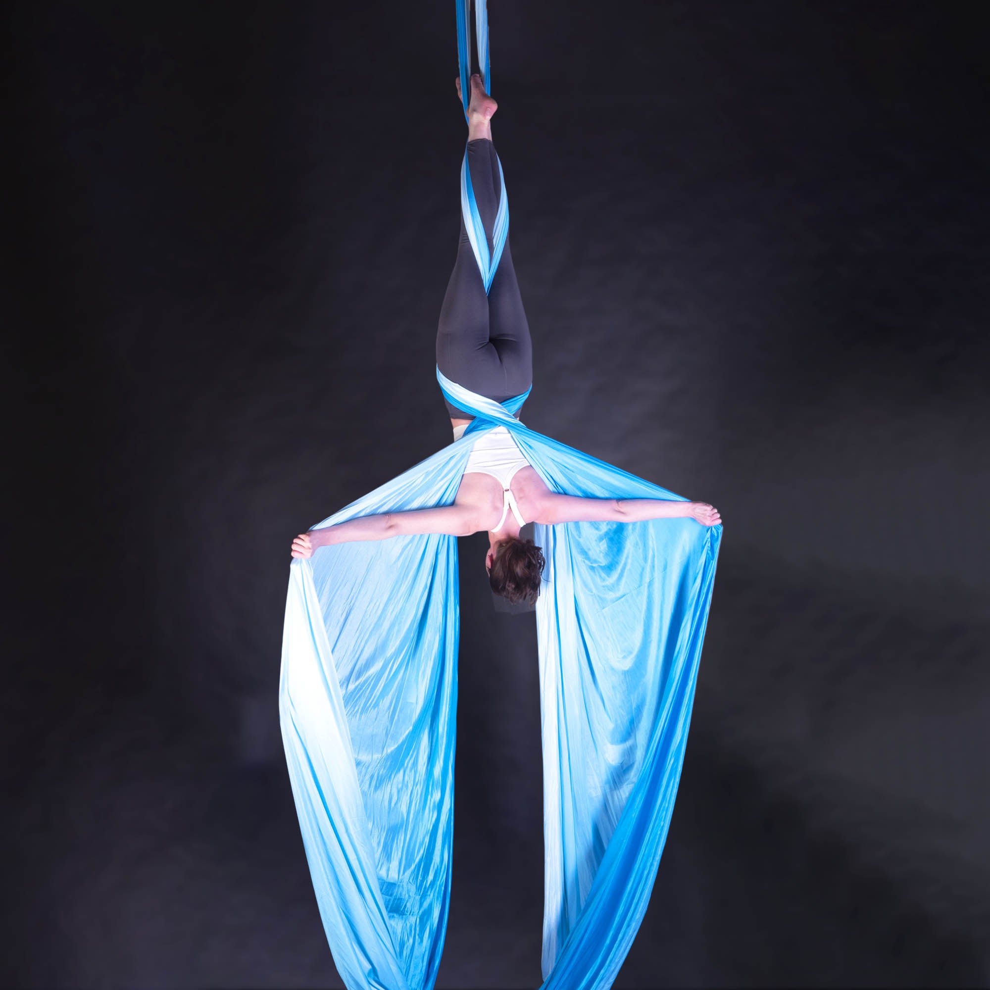 Multicoloured blue ombre silk action shot