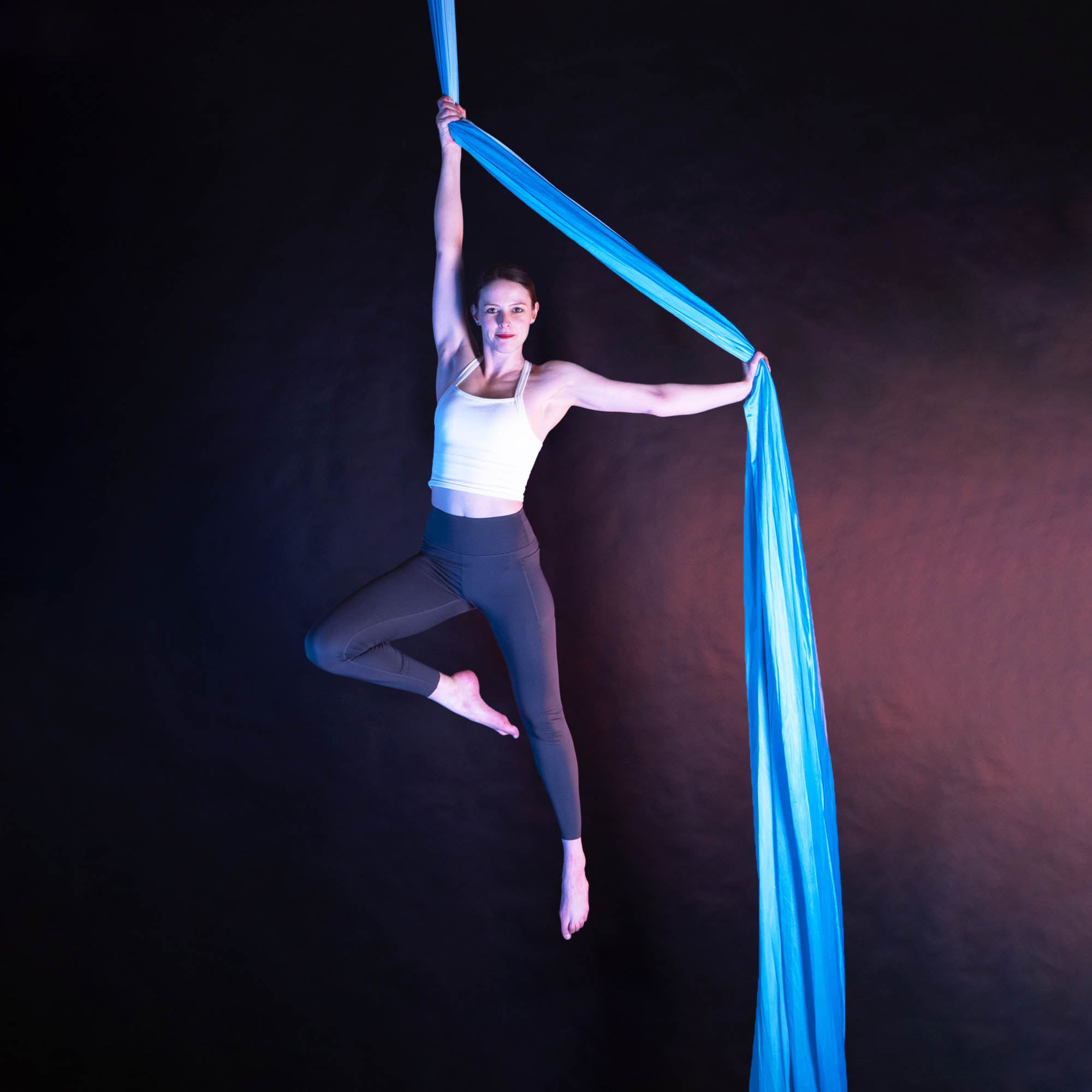 Multicoloured blue ombre silk action shot