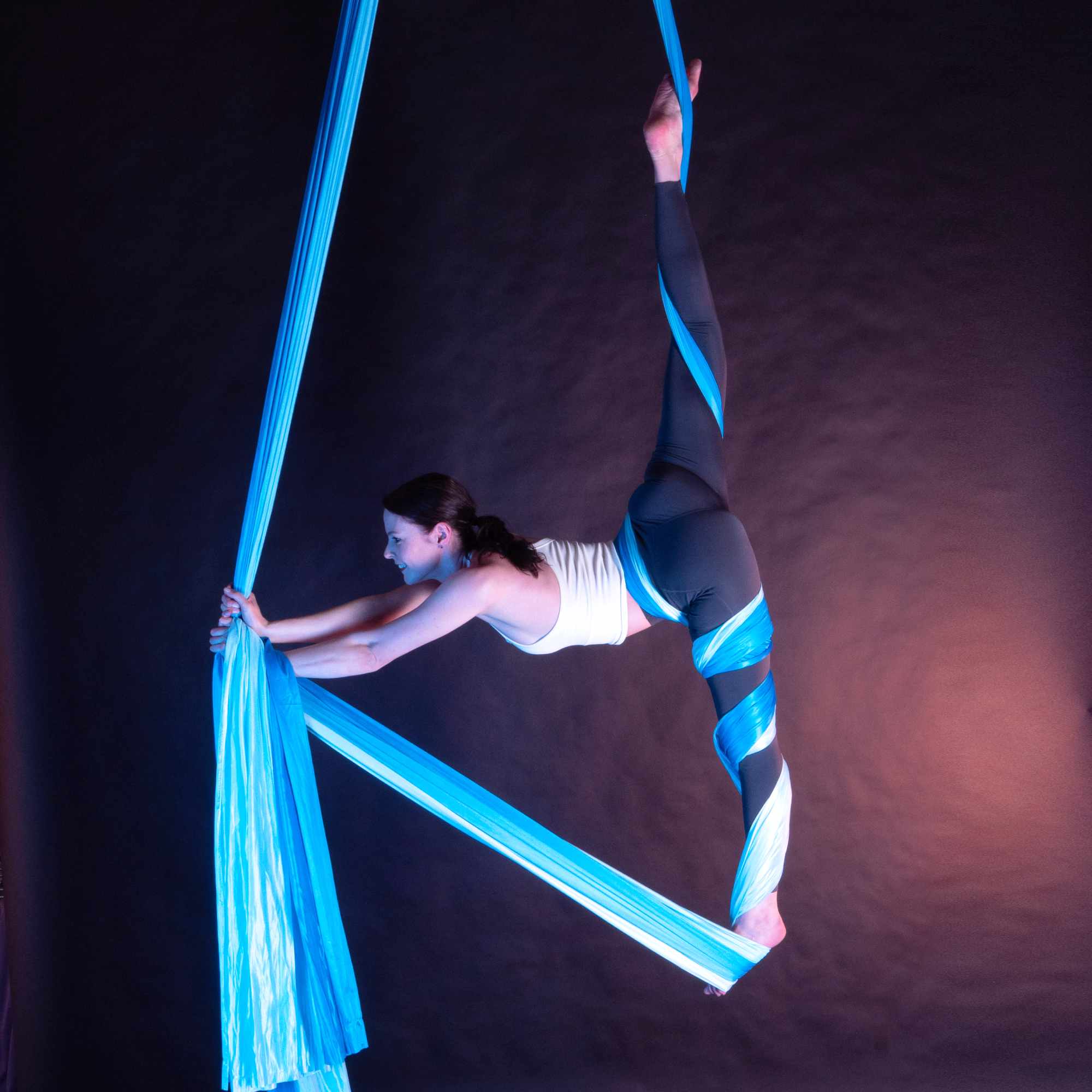 Multicoloured blue ombre silk action shot