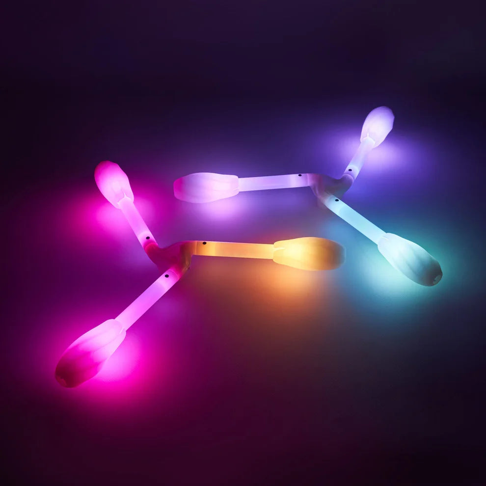 Colorful LED dragon ends on a dark background