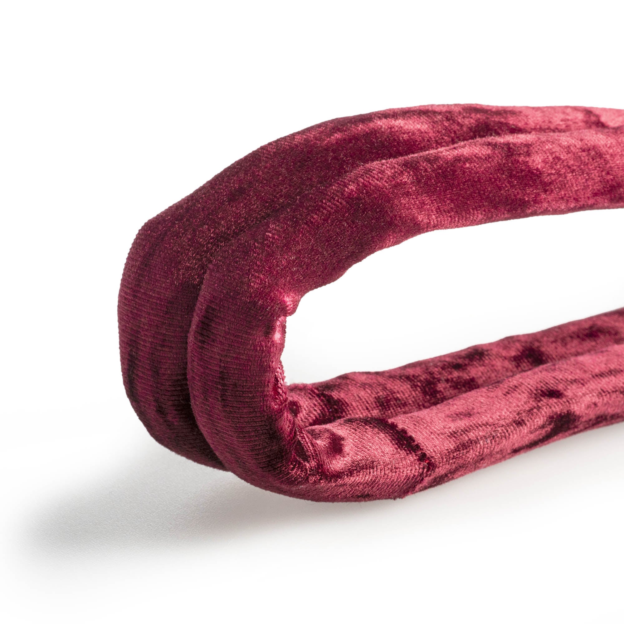 Burgundy velvet hand loop close up texture open