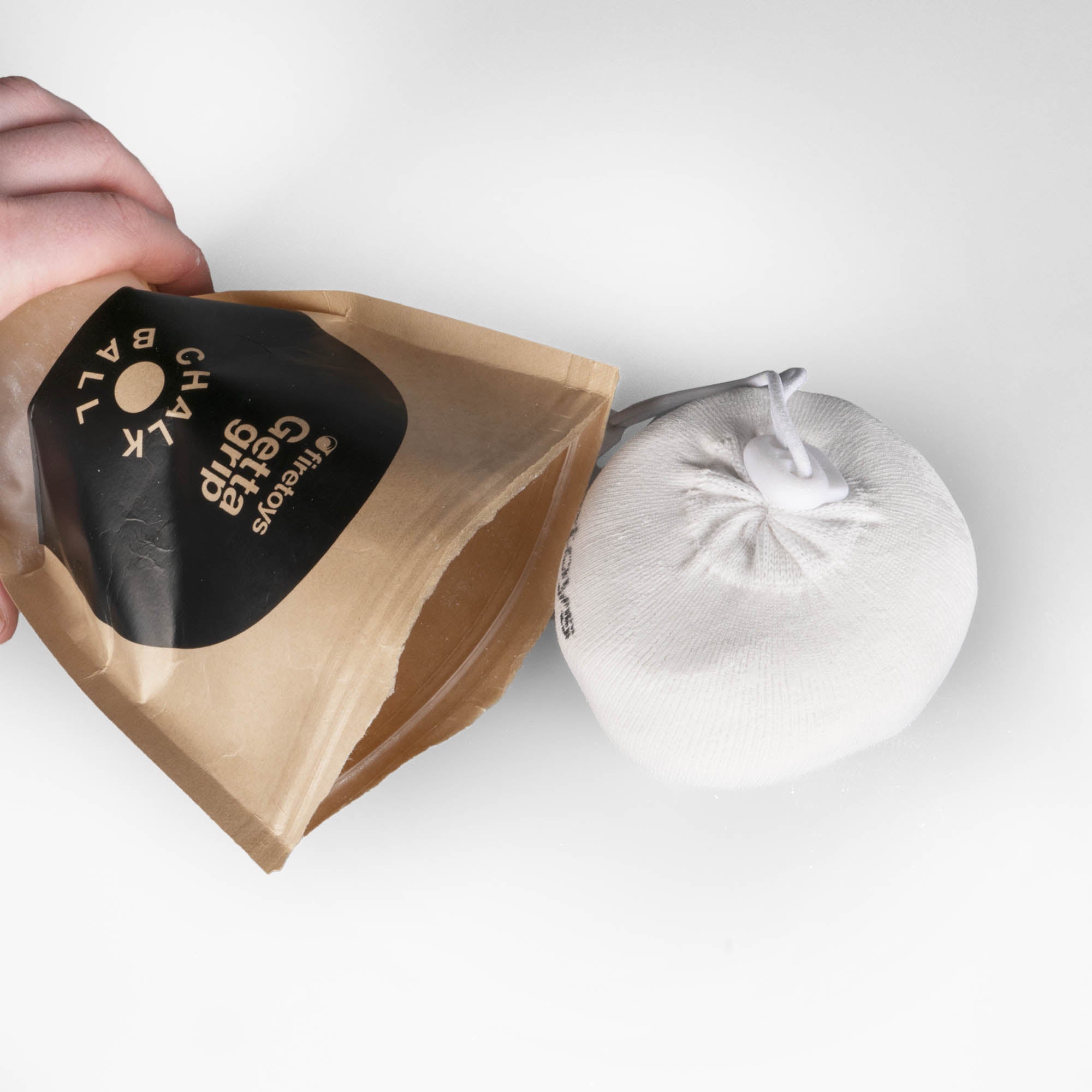 Firetoys Getta Grip Chalk ball, out of the bag with a white background
