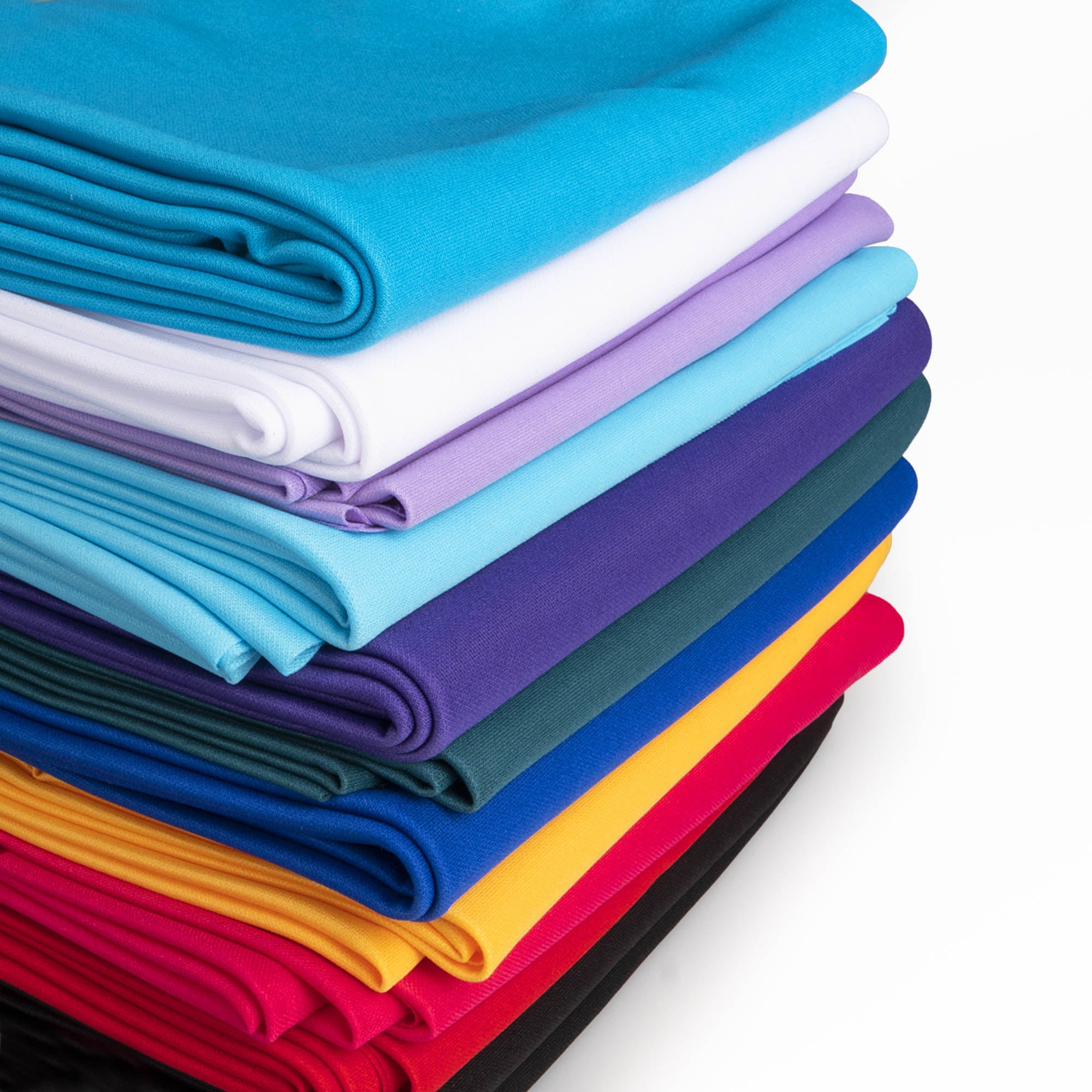 All colour variants of firetoys stretching fabric folded and stacked up