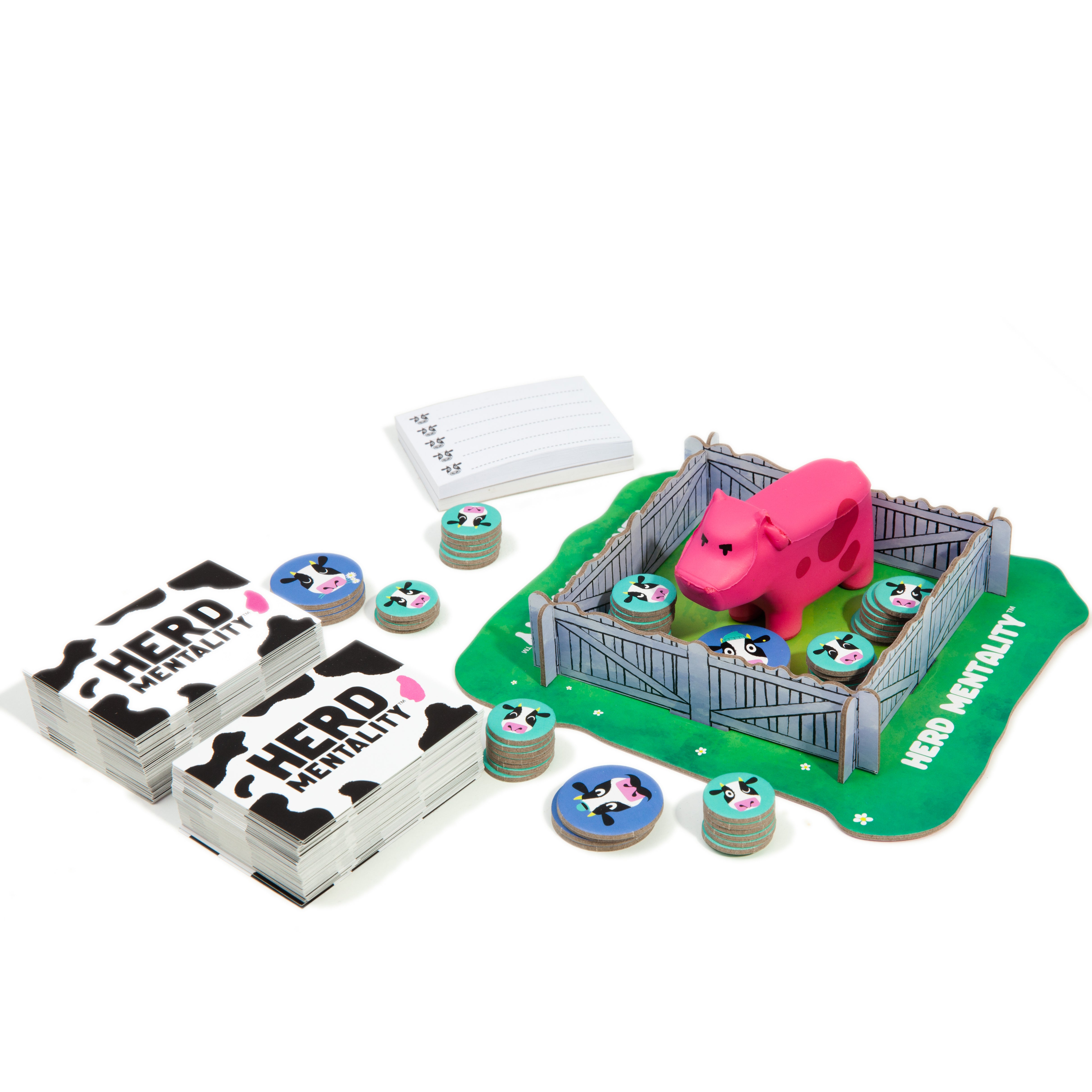 Board game set with pink pig figure, cards, and game board on a white background