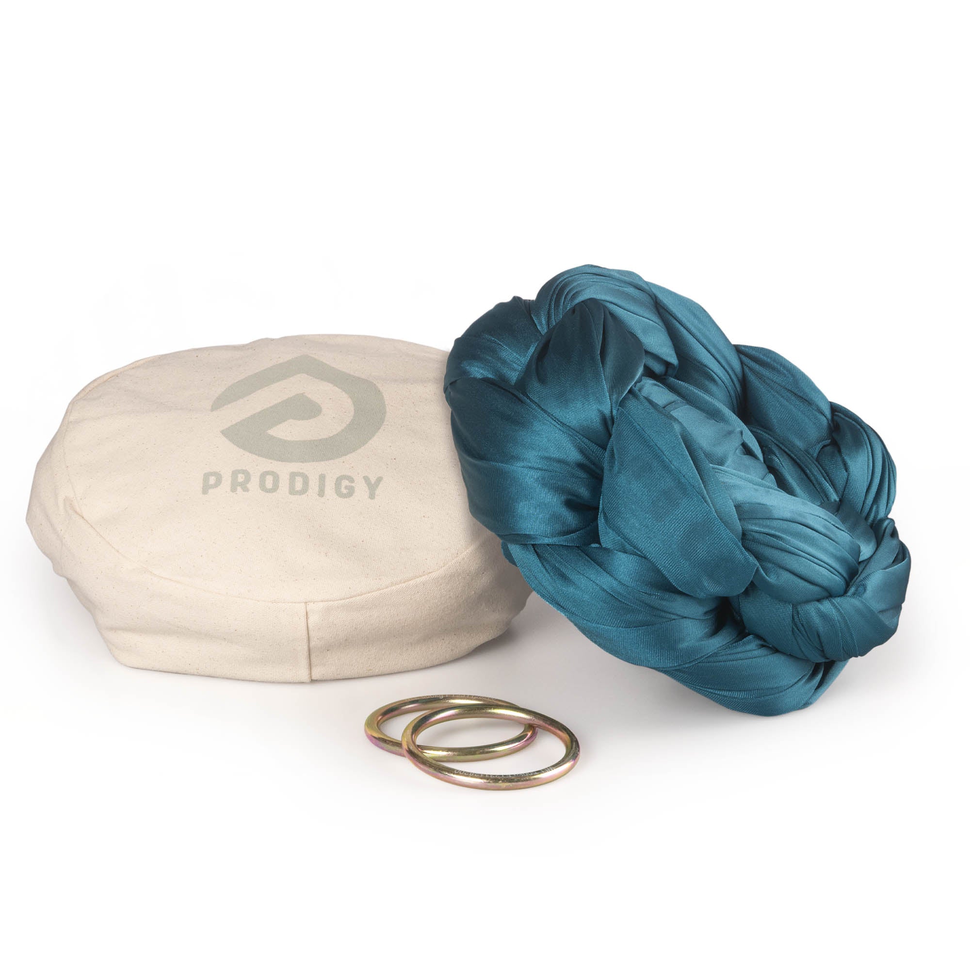 Pine green yoga hammock resting on eco bag with O-rings laying in front