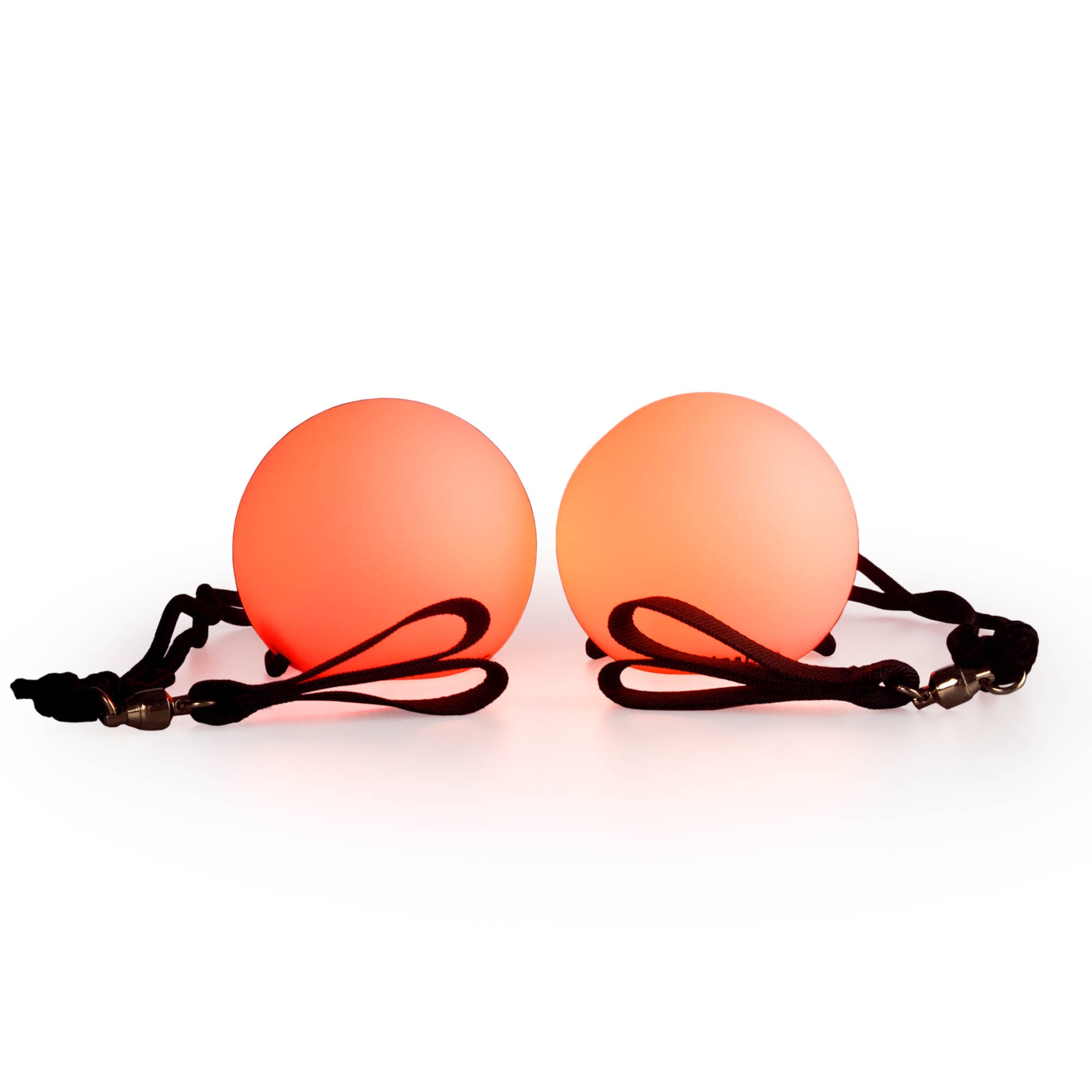 Spinballs glow poi glowing orange with a light background