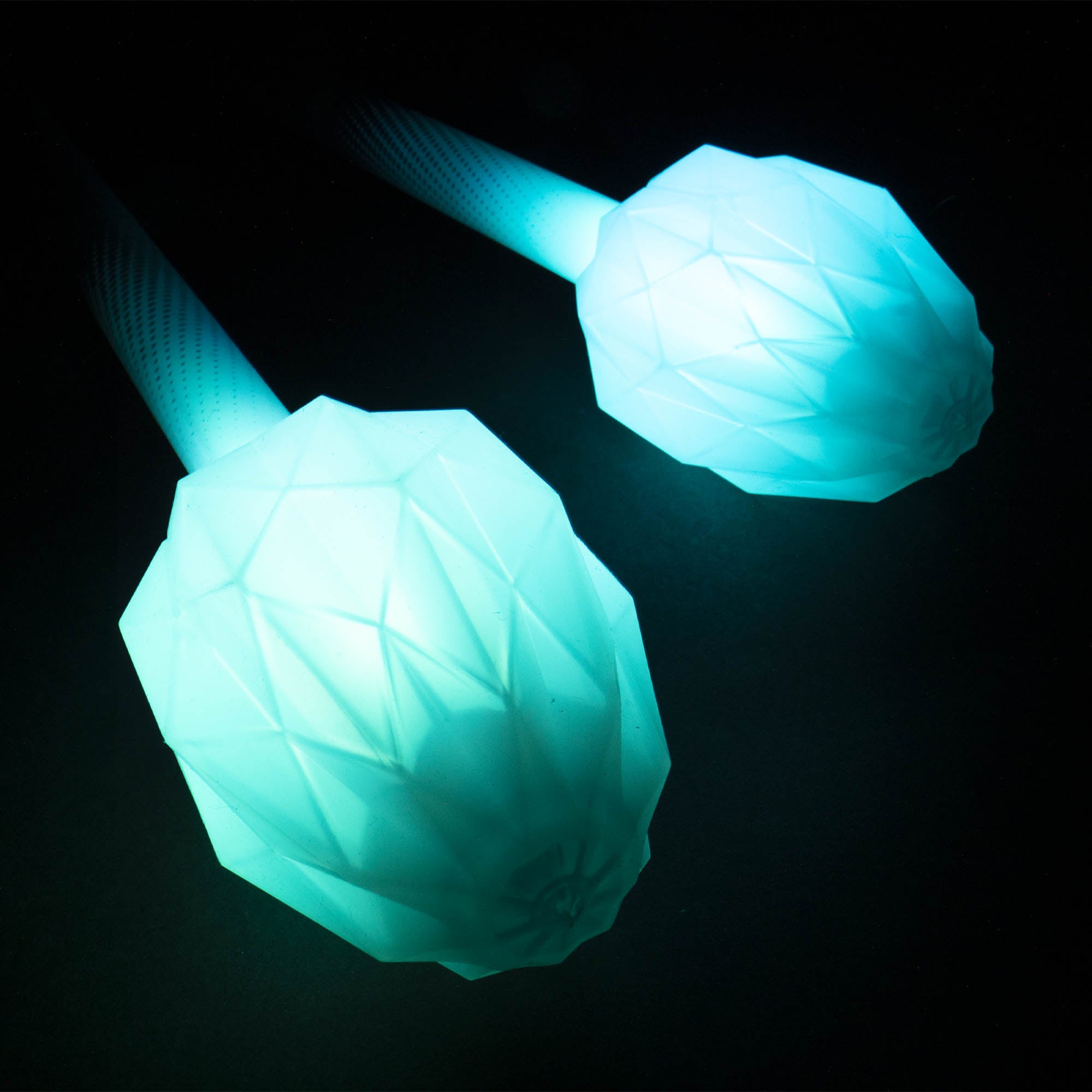 Two glowing blue ends on a black background