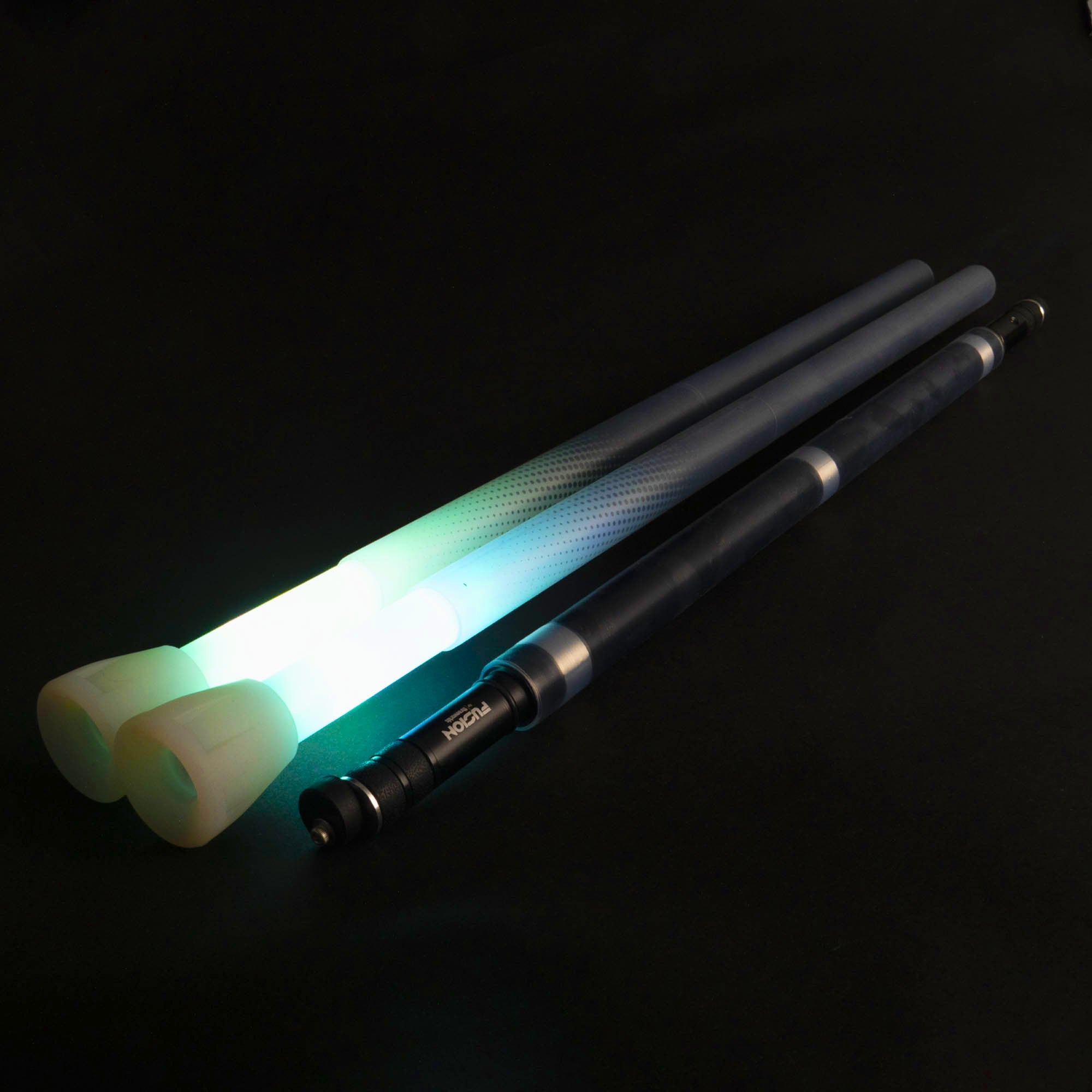 Glowing fusion staff on a black background