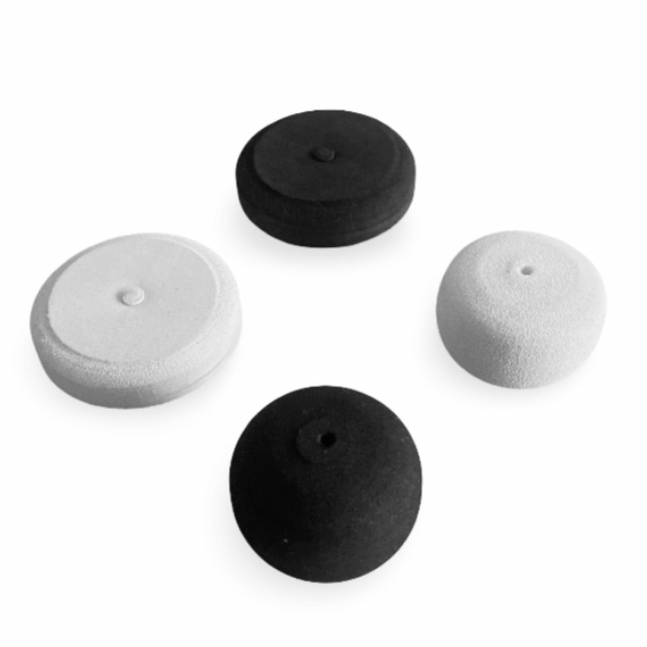 Four tops and ends in black and white on a white background