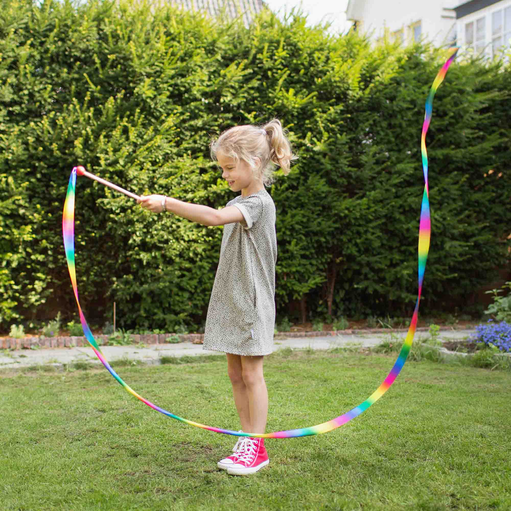 Child playing with ribbon