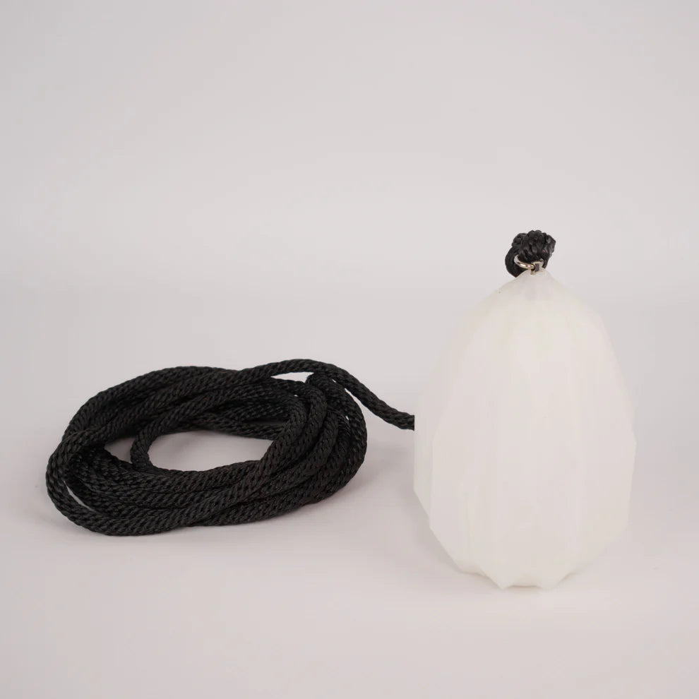 White dart with black rope on a white background