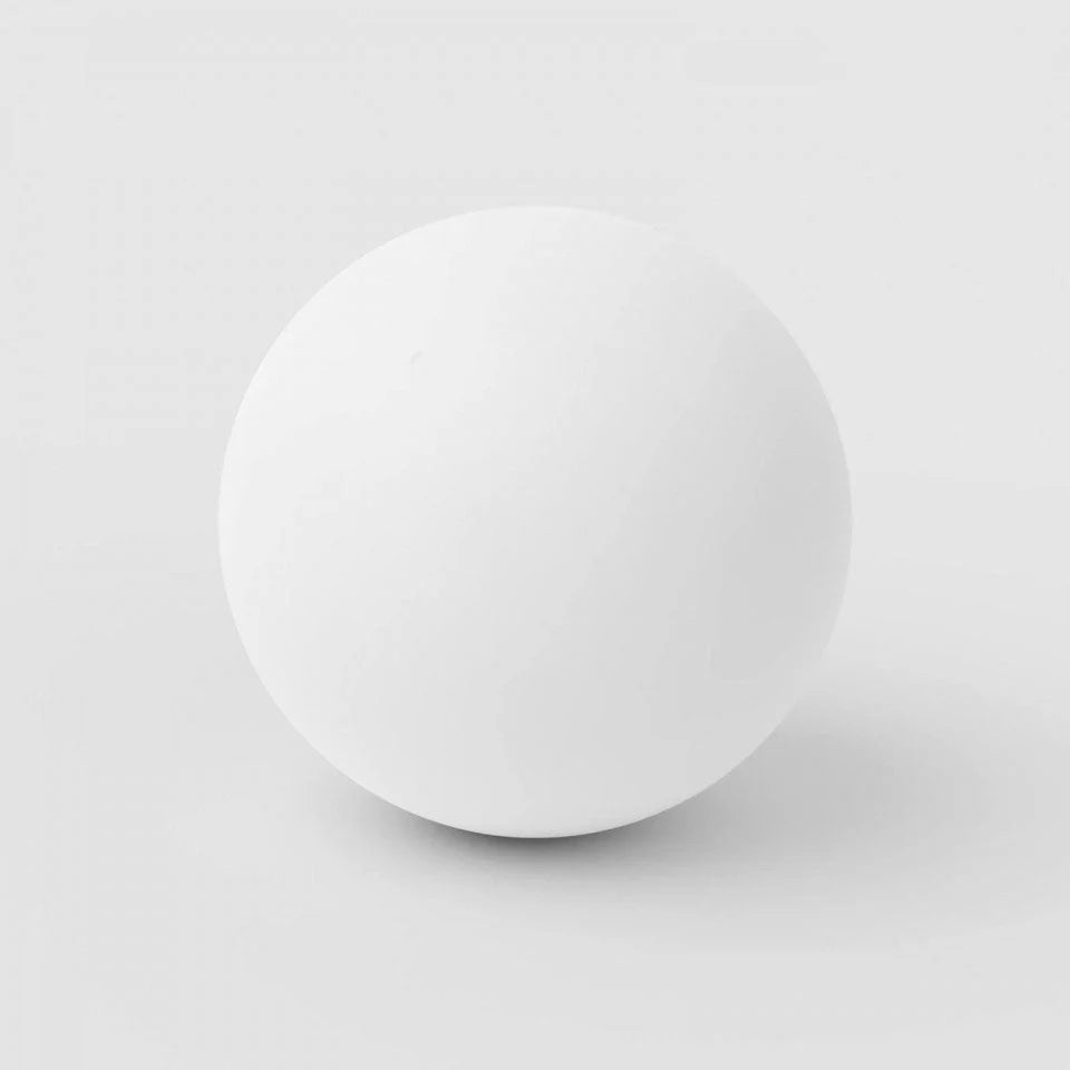 White ball on a light gray background