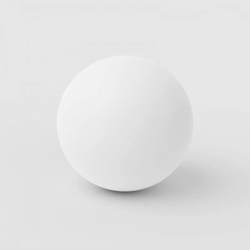 White ball on a light gray background