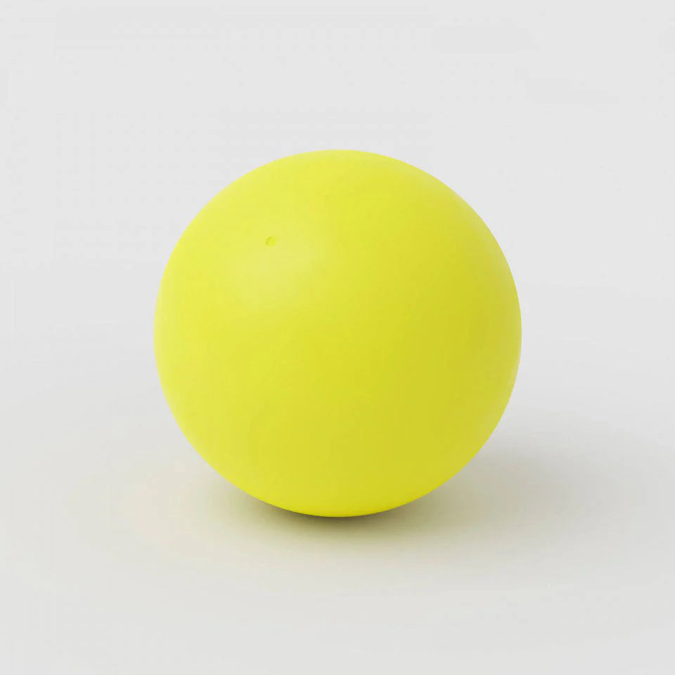 Yellow ball on a white background