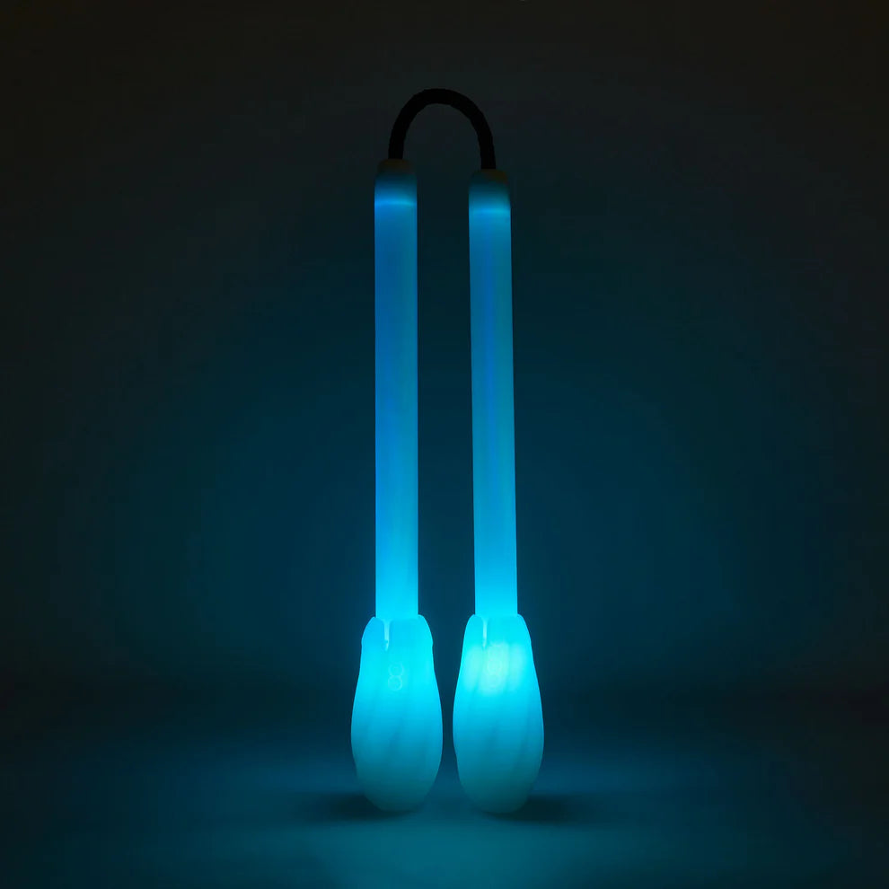 Blue glowing lumi nunchucks with a dark background
