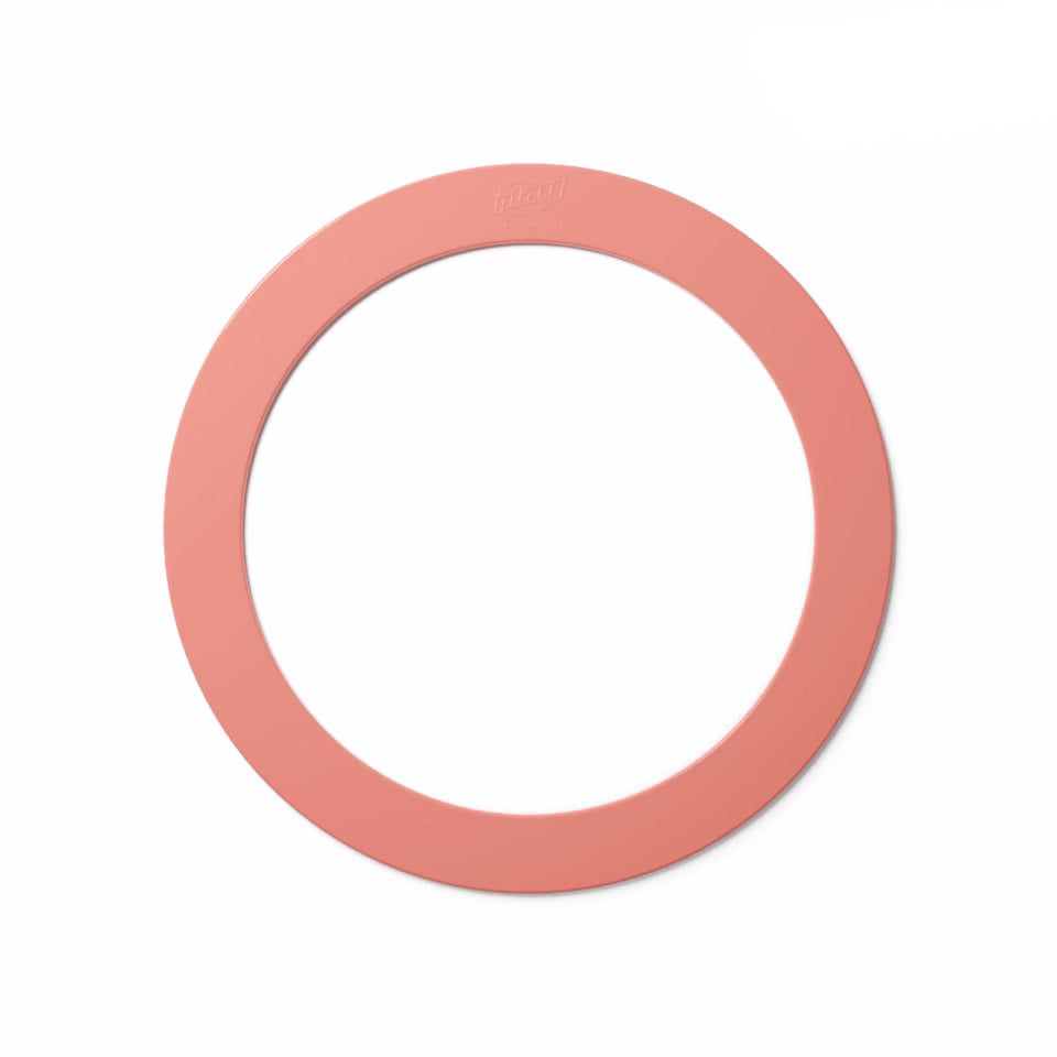 A single pastel pink juggling ring on a white background.