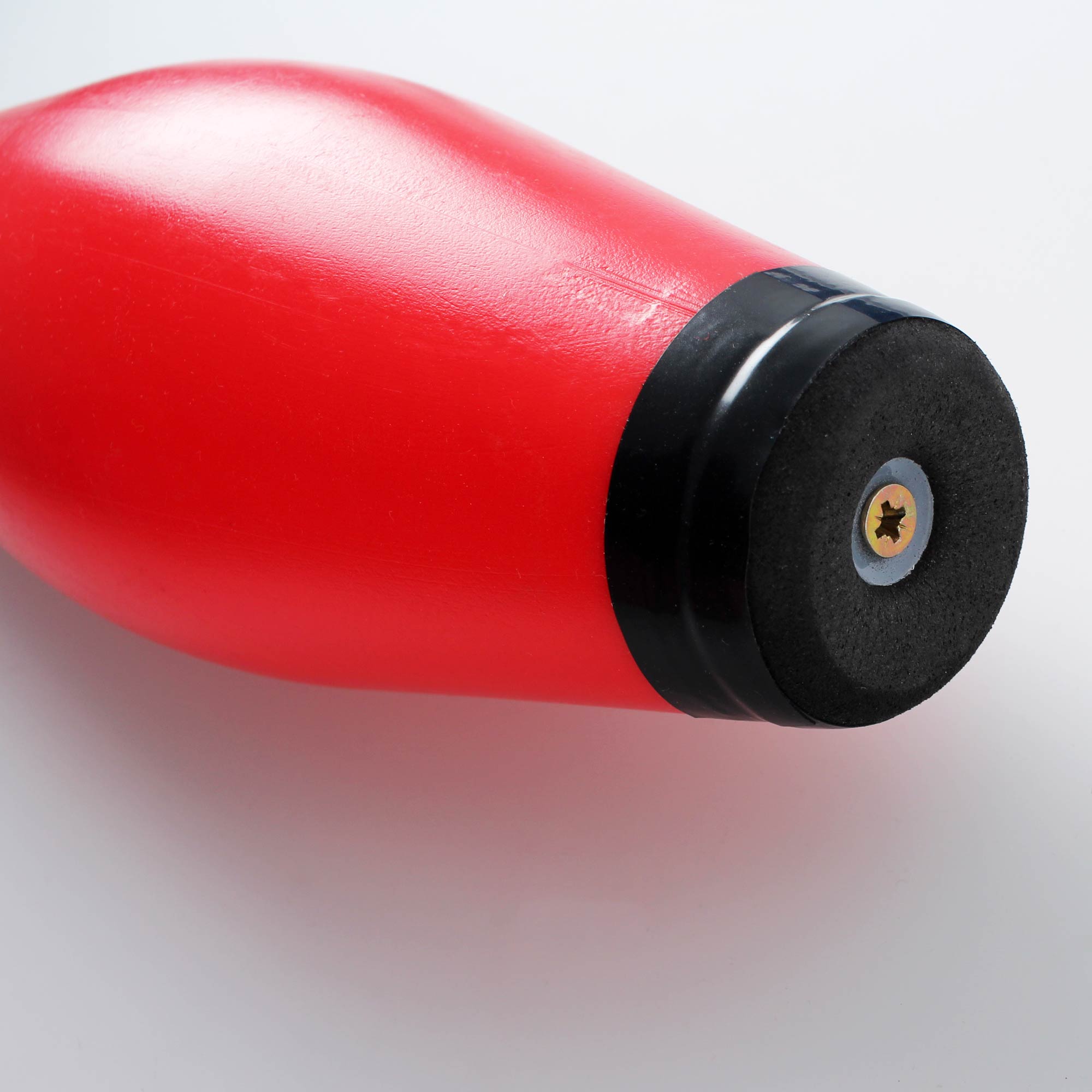 Close up top of red juggling club