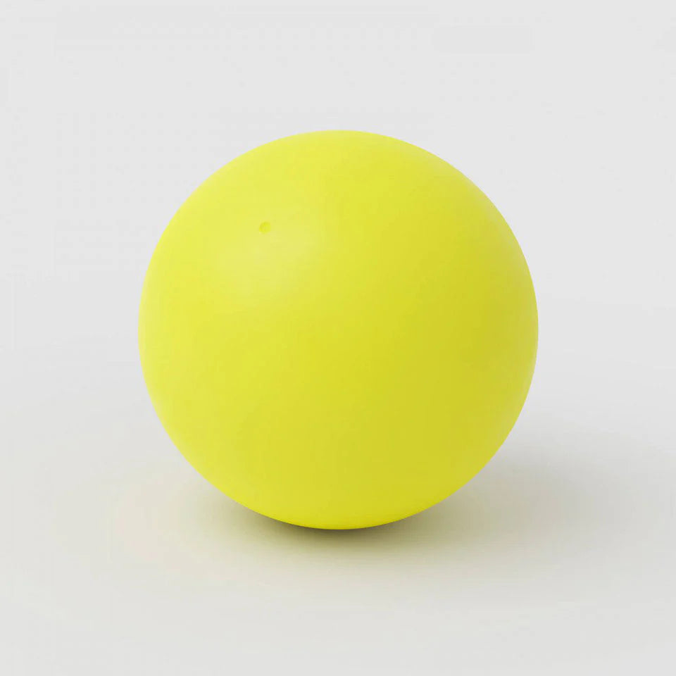 Yellow ball on a white background