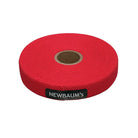 Red roll of Newbaum's tape on a white background