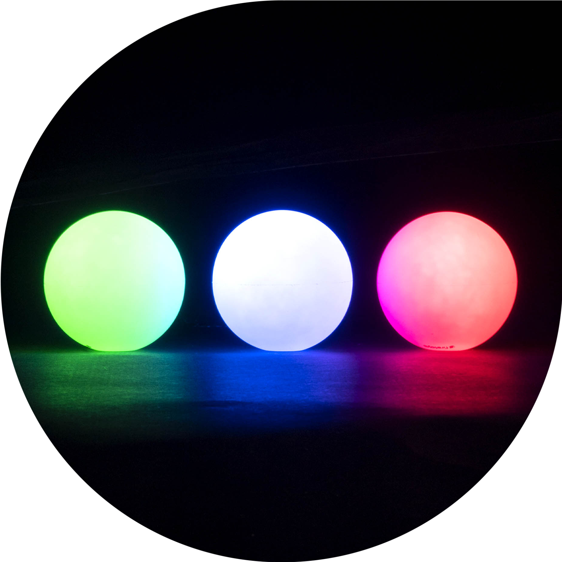 Three glowing juggling balls in a line