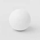 White ball on a light gray background