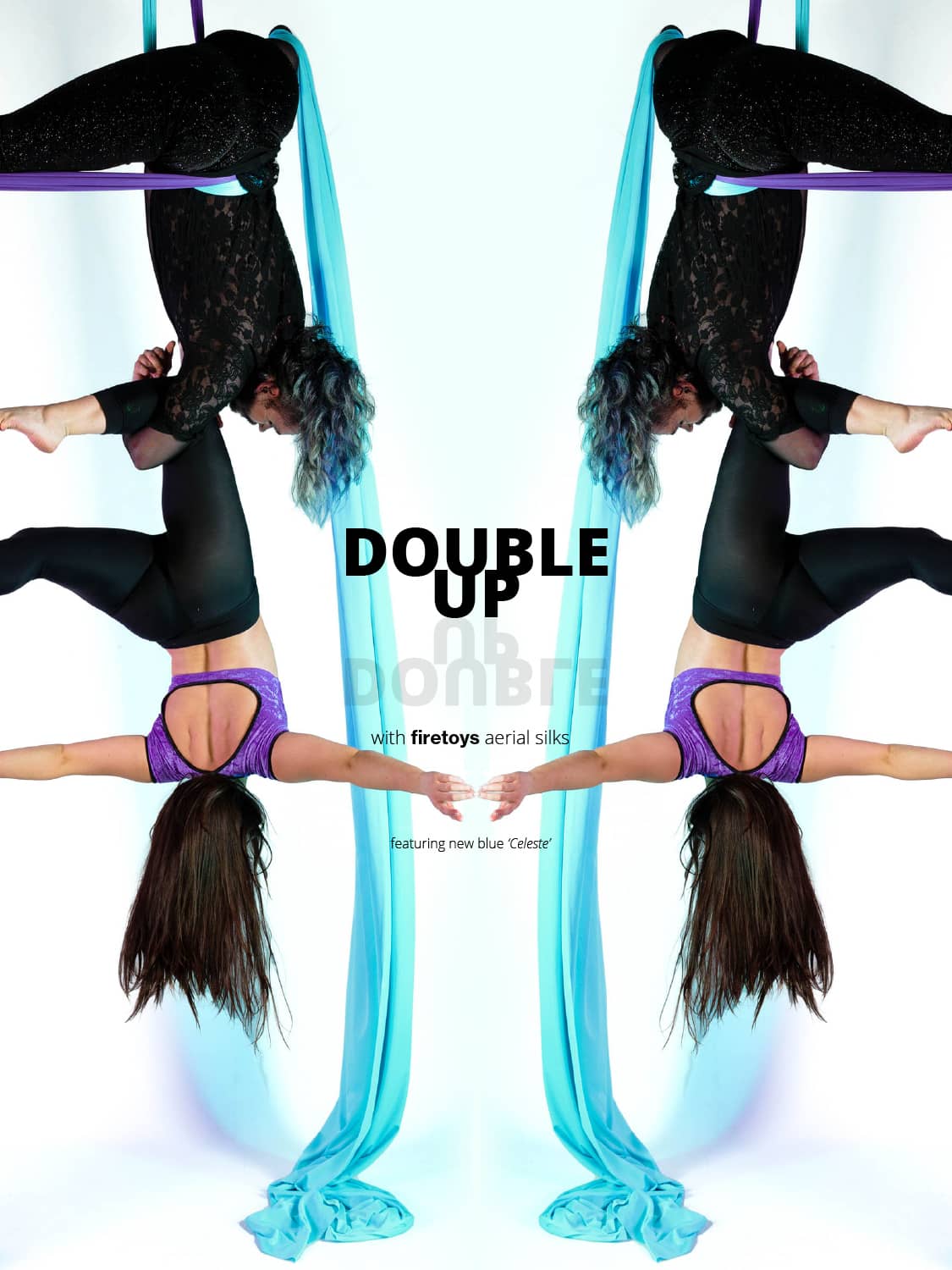 2 performers on double light blue and purple aerial silks mirrored